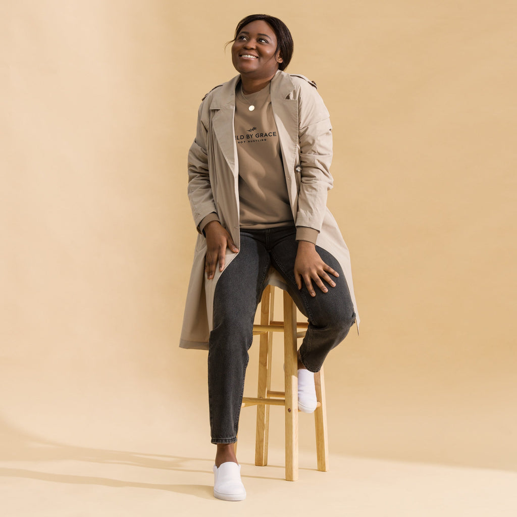 Held by Grace, Not Hustling embroidered premium sweatshirt in Latte, product view