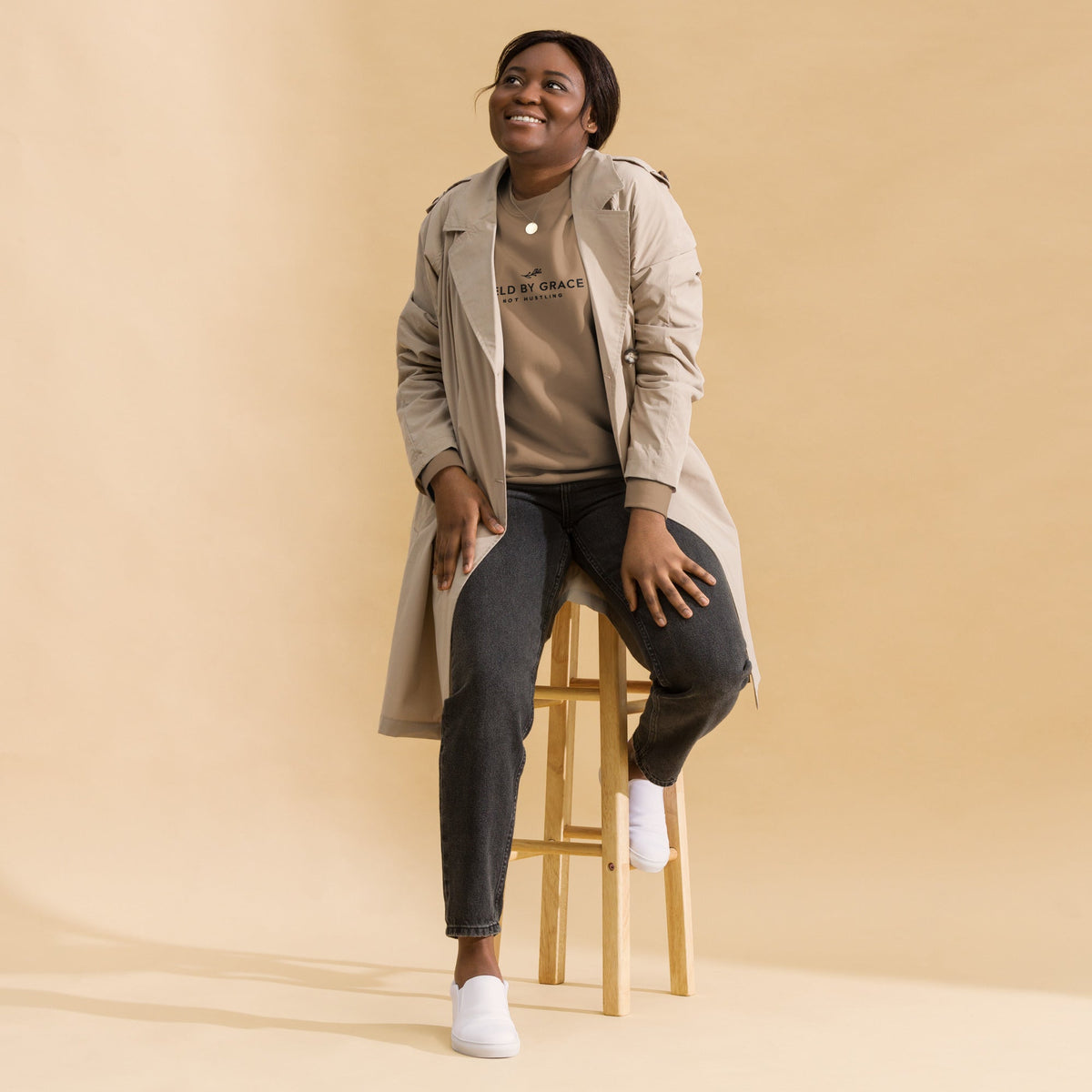 Held by Grace, Not Hustling embroidered premium sweatshirt in Latte, product view