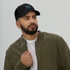 His Grace is Enough | Embroidered Trucker Cap in Black, back view